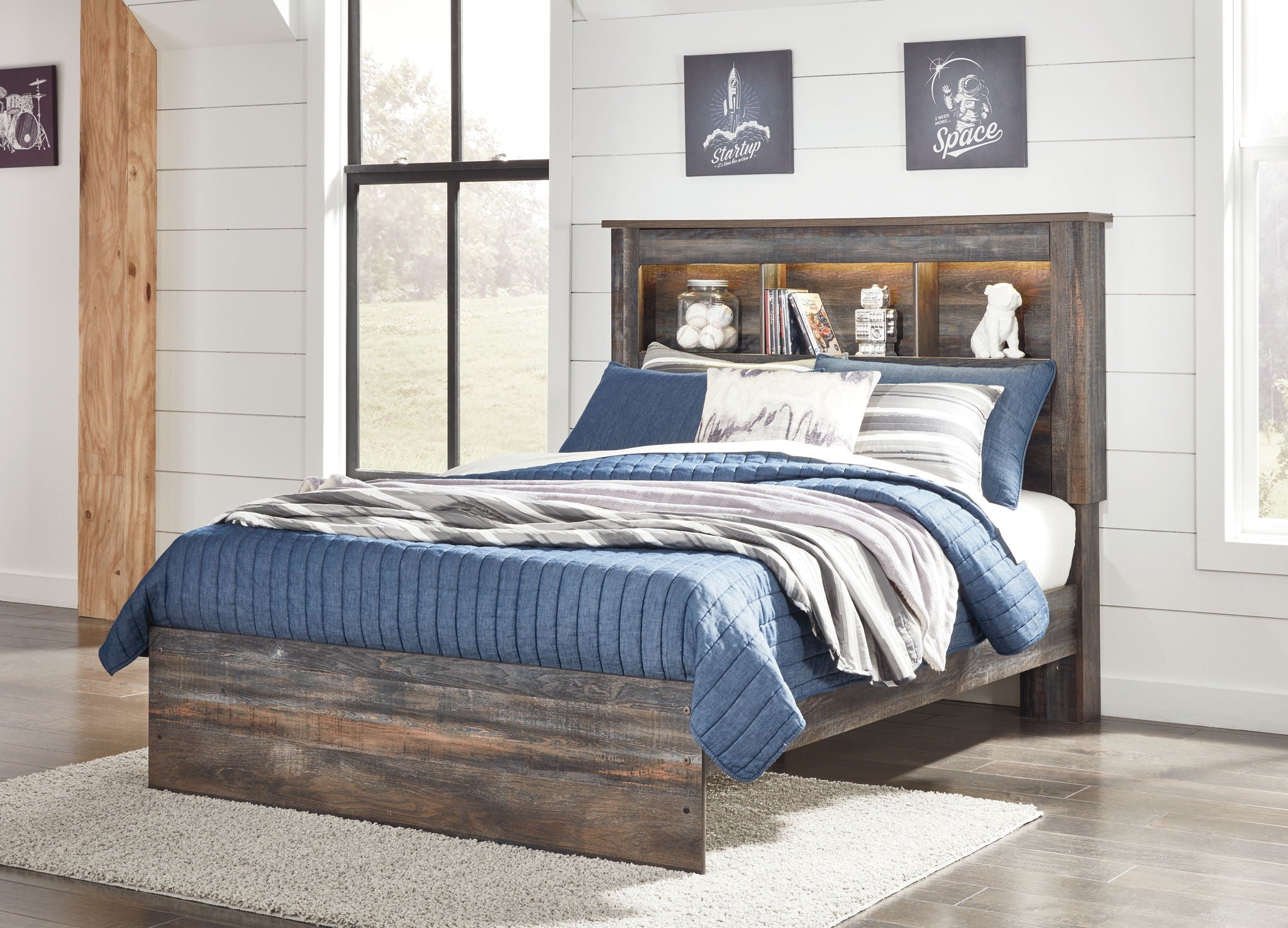 Panel bookcase bed with under-drawer storage, dark wood frame, blue bedding, open back shelf