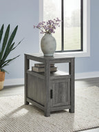 Chair side end table in gray wood with open shelf and cabinet door with black pull
