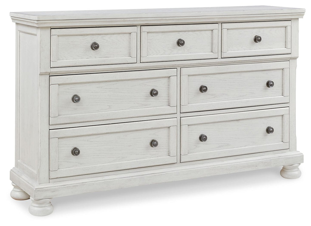Antique white dresser with nine drawers and metal knobs, straight top rail.
