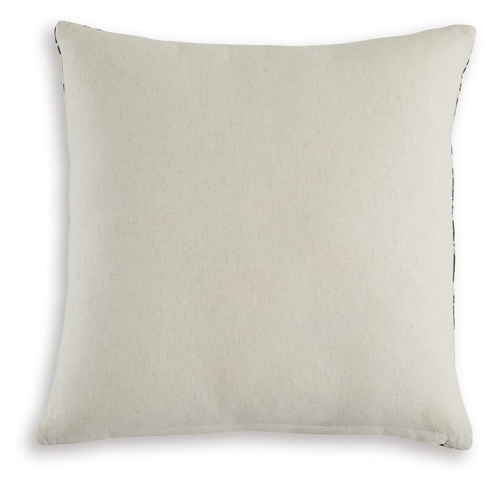 Beige solid decorative pillow with stitched edge and corner seam