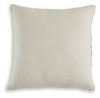 Beige solid decorative pillow with stitched edge and corner seam