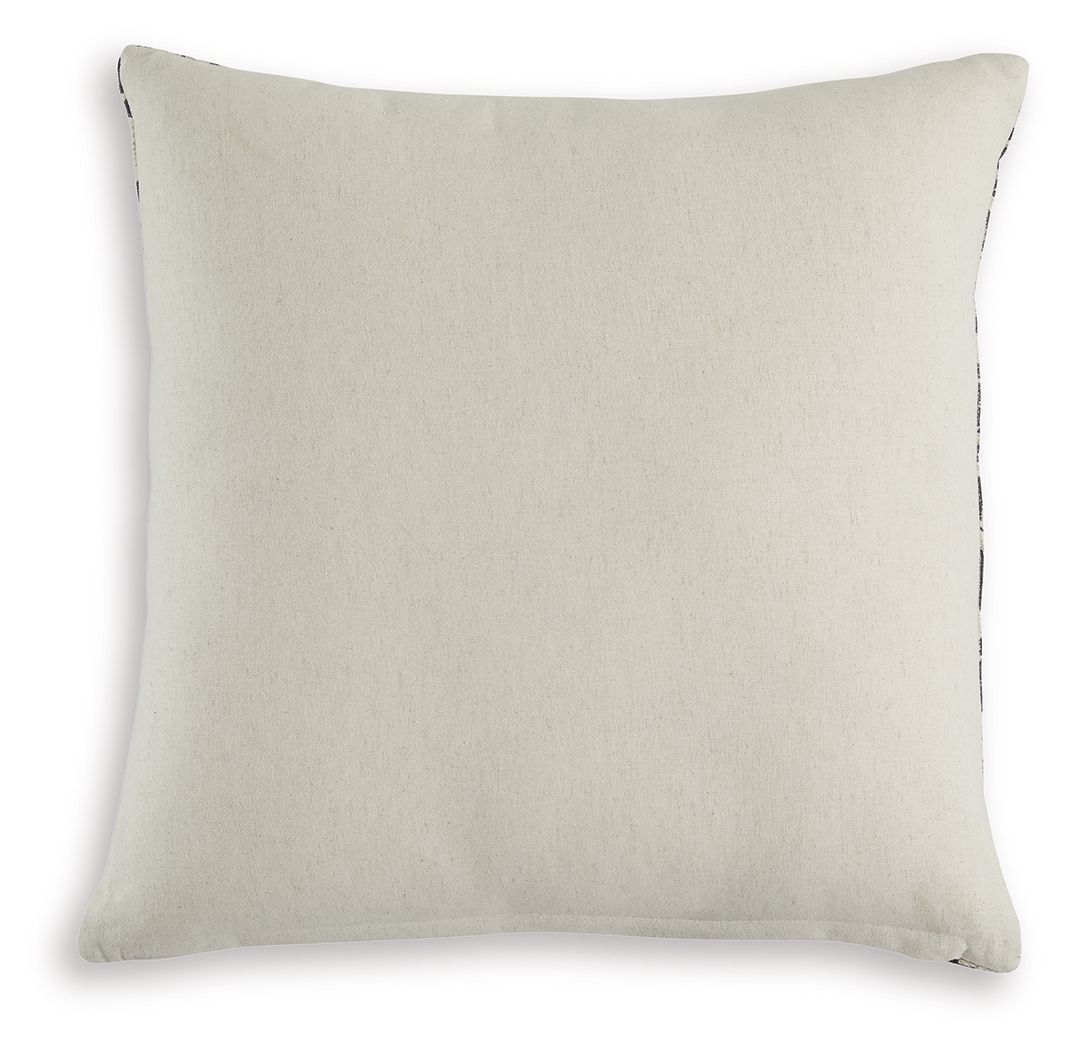 Beige solid decorative pillow with stitched edge and corner seam