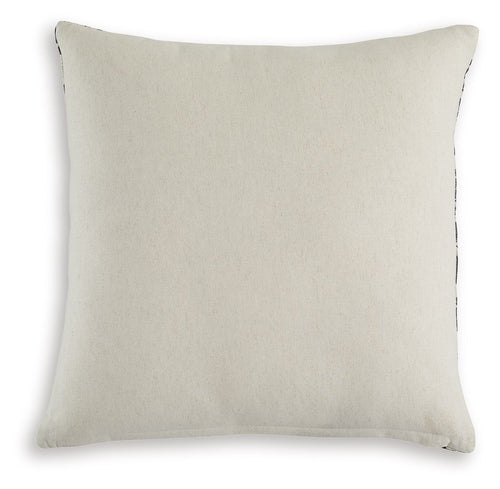Beige solid decorative pillow with stitched edge and corner seam