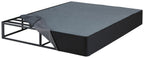 Black foundation base with dark gray top on metal bed frame, angled view