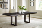 Rectangular dining table with butterfly extension, dark gray-brown top and dark legs.