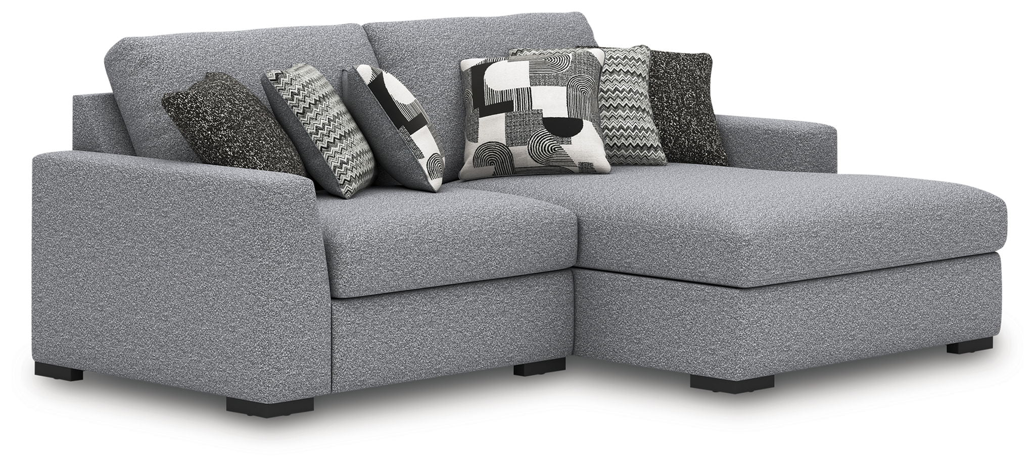 Gray fabric sectional sofa with corner chaise and patterned accent pillows