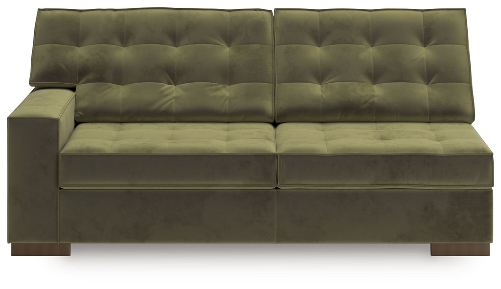 Olive tufted sofa with split back cushions, wide arms, and padded seat