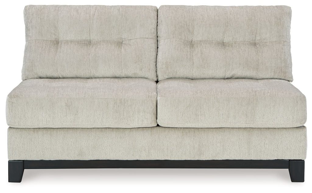 Stone armless loveseat with two-seat backrest, tufted seat cushions, dark base legs