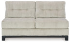 Stone armless loveseat with two-seat backrest, tufted seat cushions, dark base legs