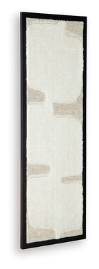 Framed wall art with off-white textured panel and taupe block pattern, black frame