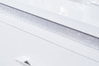 White tabletop edge with textured sparkle strip and straight silver drawer pull