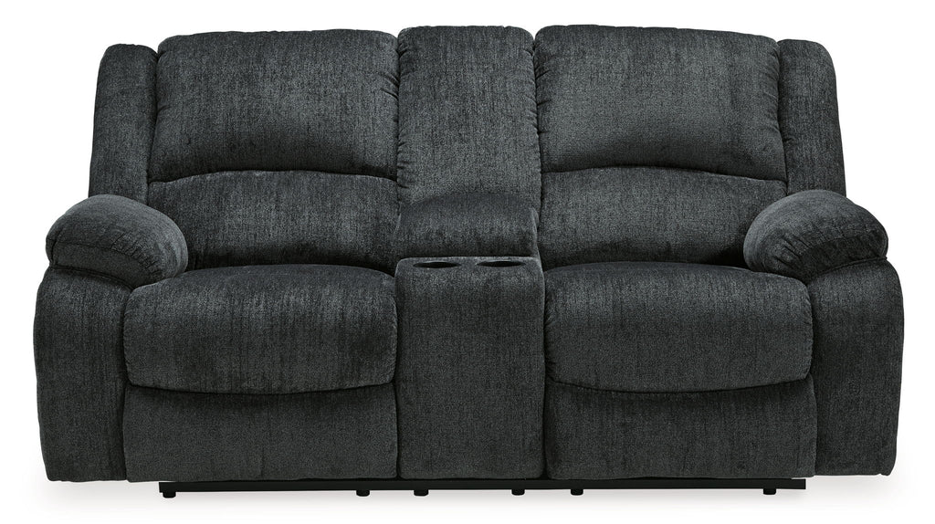 Dark gray reclining loveseat with two seat sections and padded back cushions
