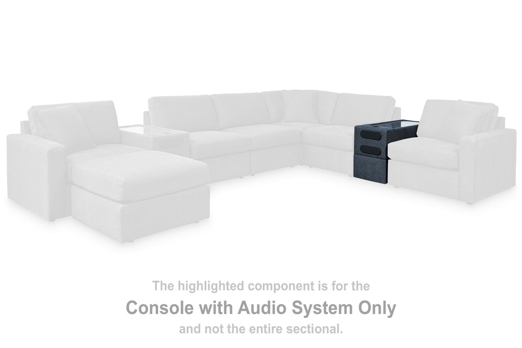 Dark audio console component highlighted in a white modular sectional