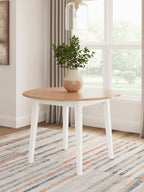Round drop-leaf dining table with light wood oval top and white legs