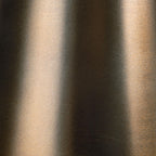 Bronze accent table pedestal finish texture close-up with smooth metal sheen