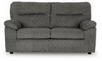 Mineral dark gray loveseat with two lumbar cushions, rolled arms, and black feet