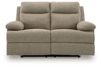 Beige reclining loveseat with two headrests, cushioned back, and center seam