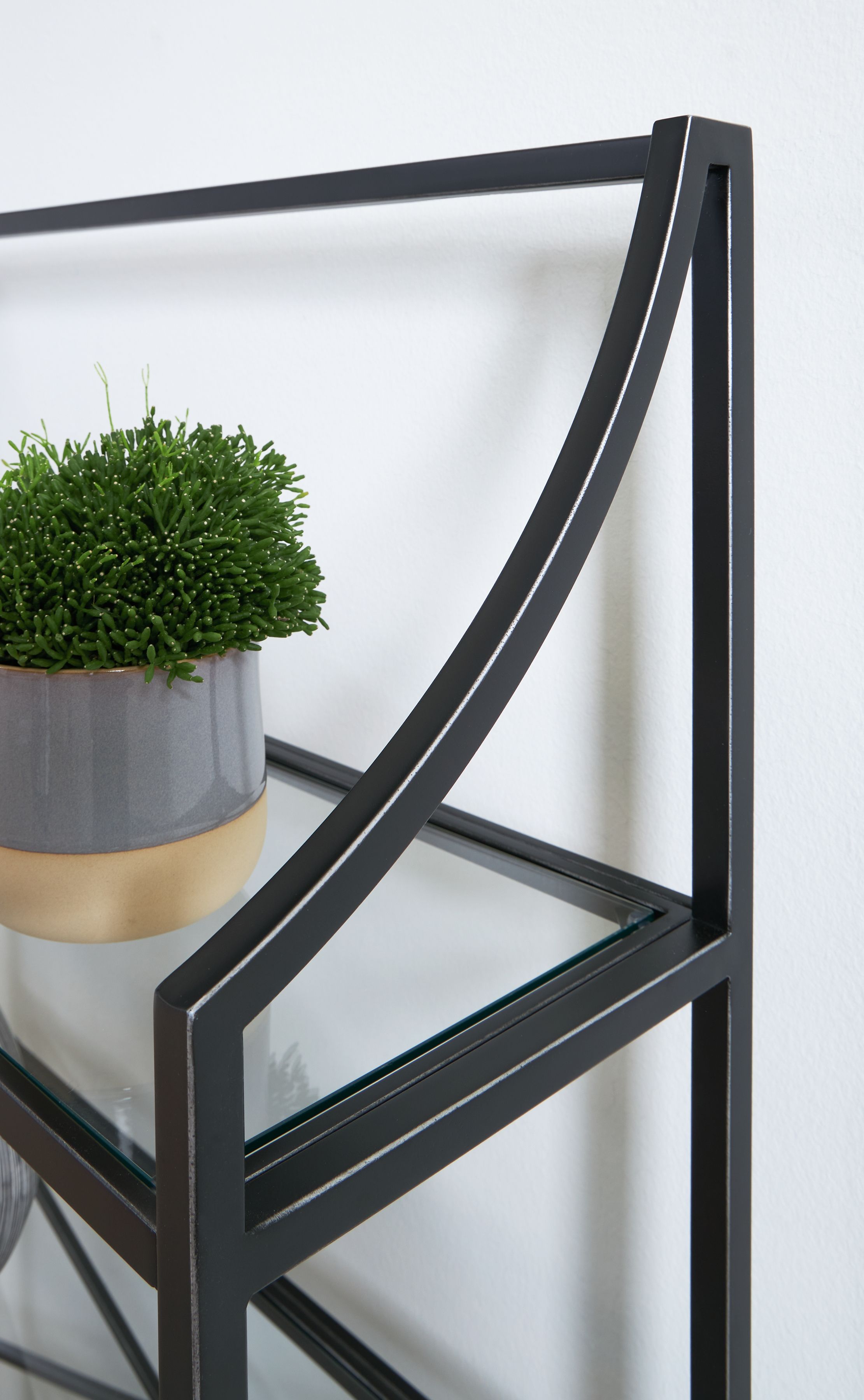 Antique black bookcase frame with curved corner supports