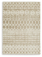 Tan and cream area rug with geometric diamond, cross and circle pattern, border edge