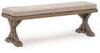 Outdoor bench with beige cushion and angled wooden legs