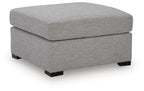 Oversized fabric ottoman in pewter gray with squared top and black block feet