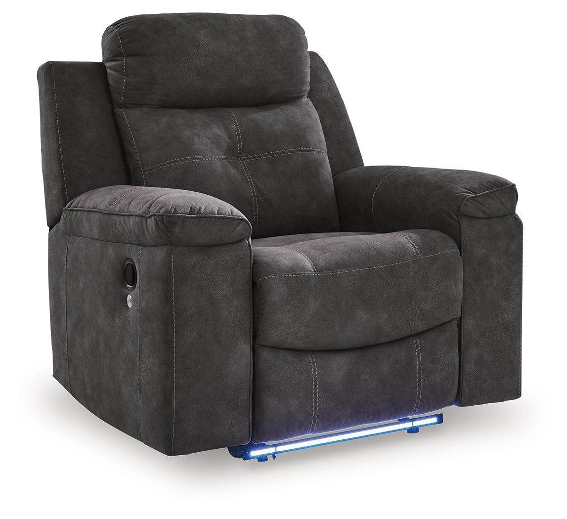 Charcoal zero-wall recliner with padded headrest, armrests, and cushioned seat/leg rest