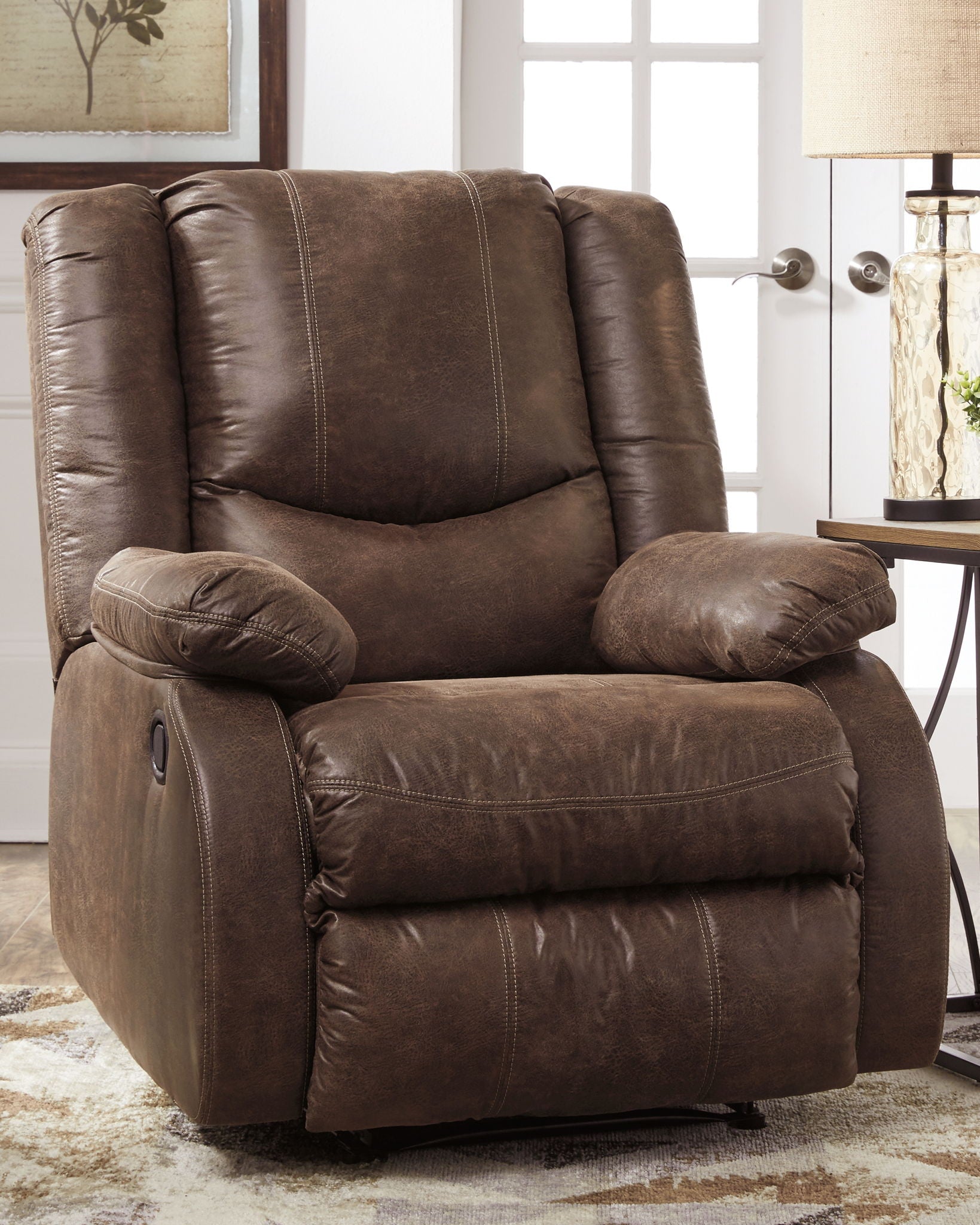 Bladewood recliner in dark coffee brown with side storage panel and padded ottoman footrest