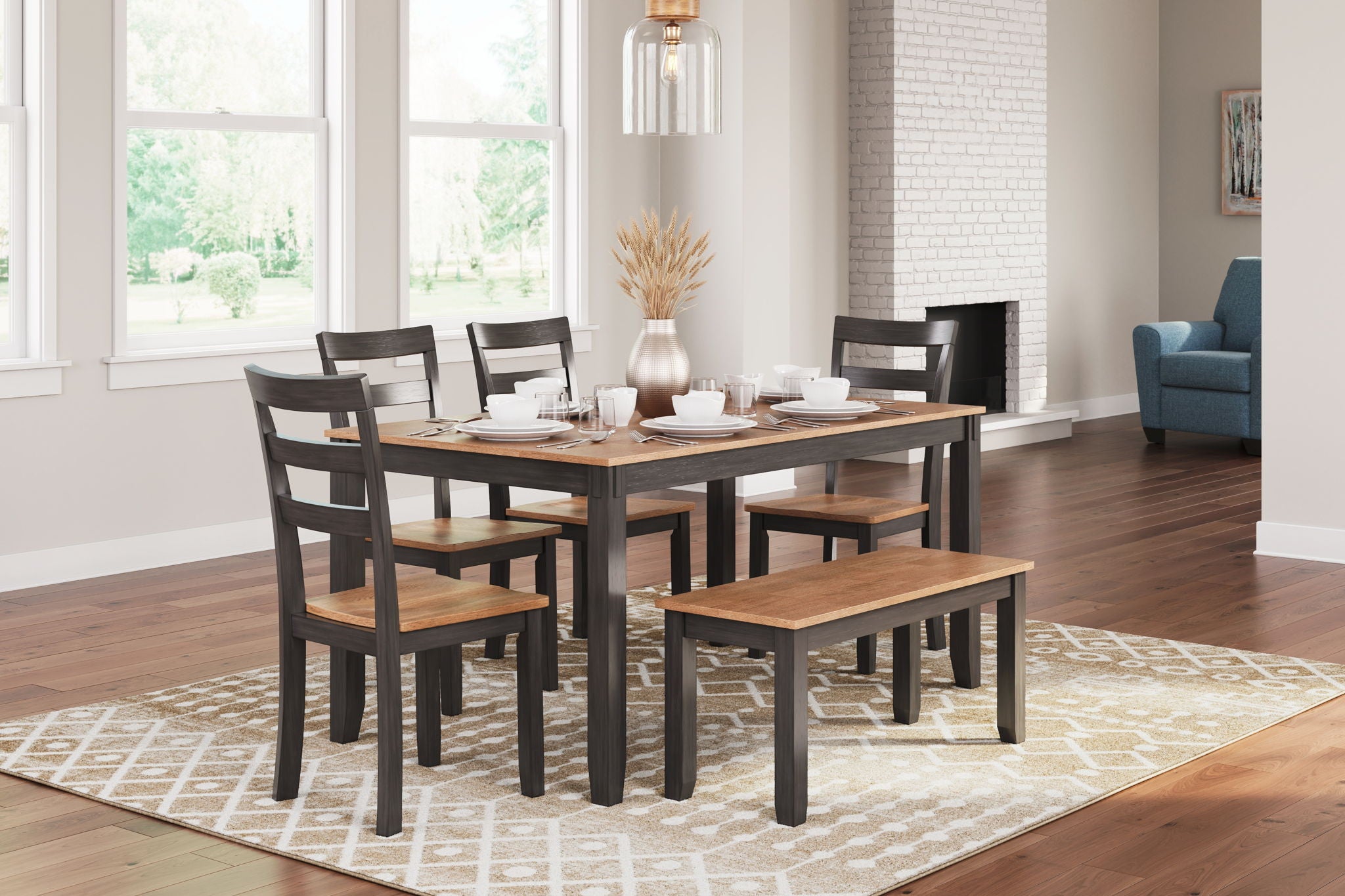 Dining table with dark chairs and wood tabletop