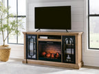 Light brown TV stand with mounted TV, glass doors, and electric fireplace insert beneath.