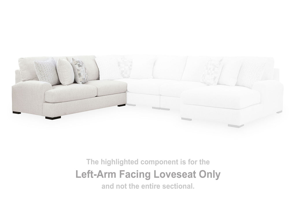 Chalk sectional sofa with left-arm facing loveseat and extended chaise seating