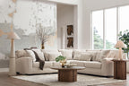 Light beige sectional sofa with chaise corner and patterned throw pillows