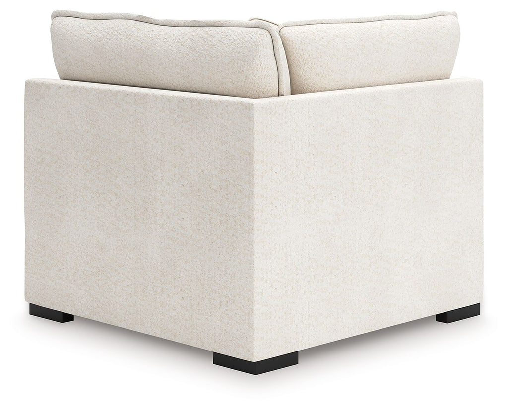 Vanilla-beige corner chair with track arms, squared seat, and dark block feet