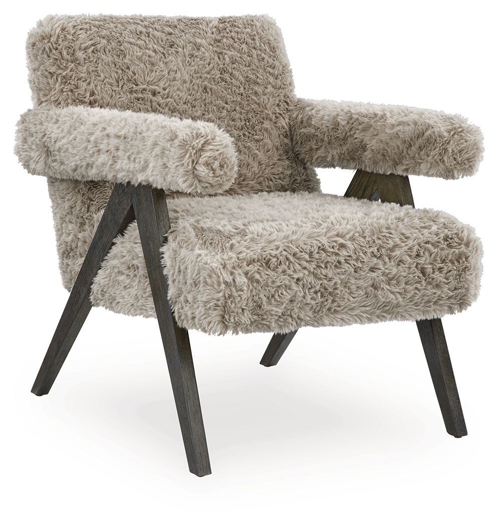 Shaggy light gray accent chair with curved armrests and dark wooden legs