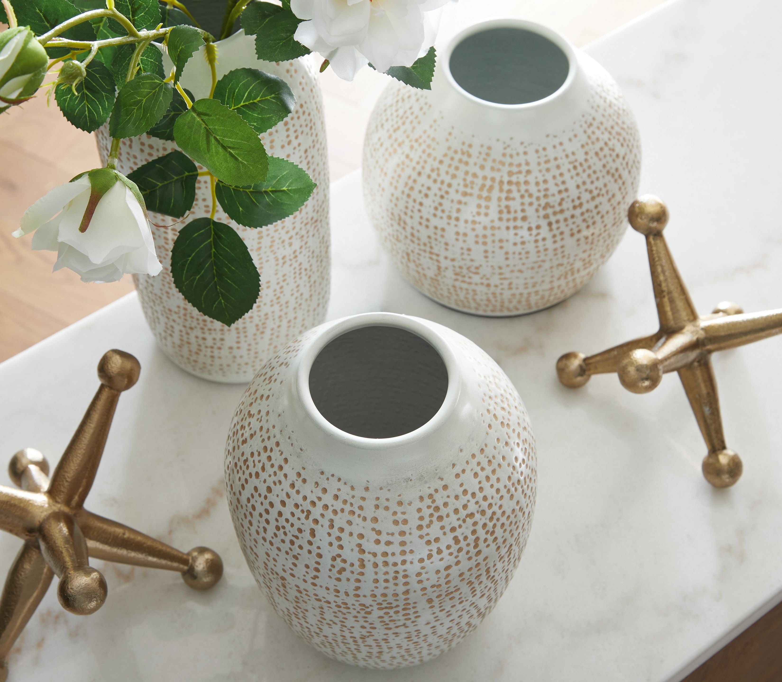 Vinburn accessory set white speckled vases with gold star holders and leafy stems
