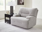Wide seat power recliner in pewter gray, padded arms and backrest.