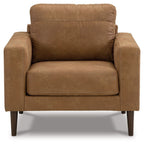 Light brown upholstered armchair front view with rounded arms and cushioned backrest