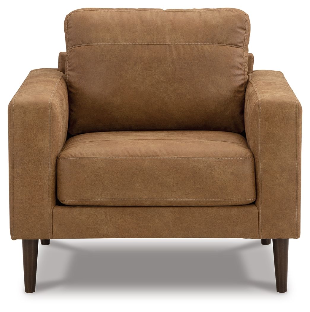 Light brown upholstered armchair front view with rounded arms and cushioned backrest