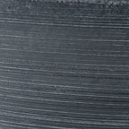 Meadie bowl ceramic surface close-up, dark blue charcoal texture