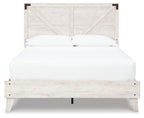 White panel bed with light wood finish, paneled headboard and footboard, white bedding
