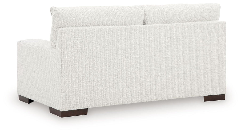 Frosted white loveseat with backrest and dark wooden legs, no visible throw pillows