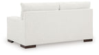 Frosted white loveseat with backrest and dark wooden legs, no visible throw pillows