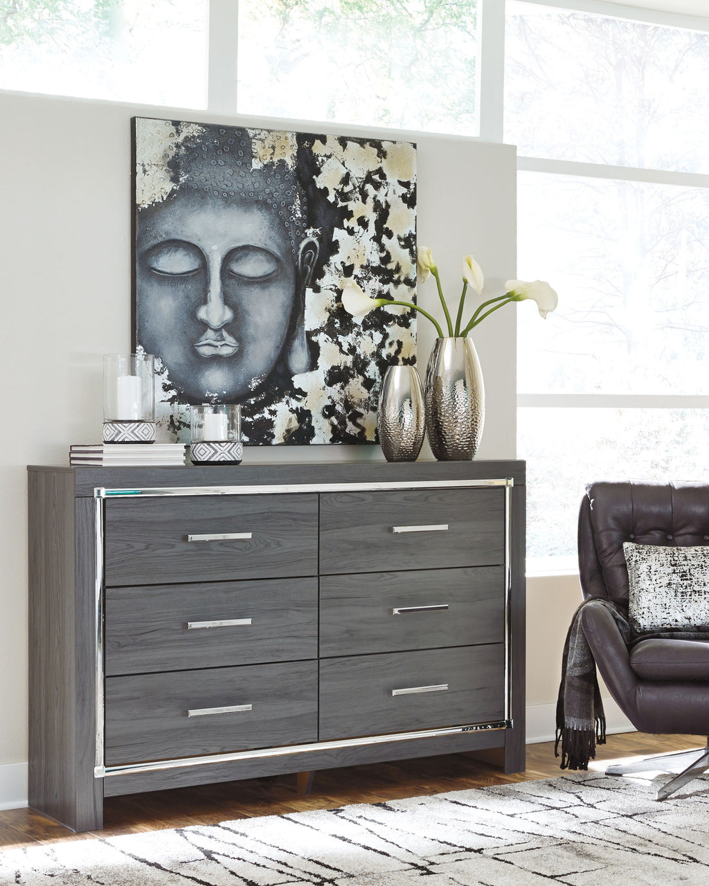 Dark gray dresser with mirror panel and six drawers, each with silver bar handles