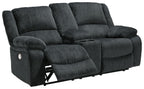 Dark gray reclining loveseat with raised footrest under the side arm