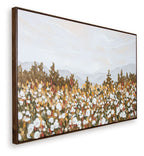 Framed wall art showing dense gold-brown and white flower dots over a soft sky