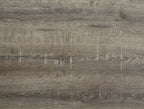 Wood-grain tabletop surface in gray-brown with subtle streaks and weathered texture