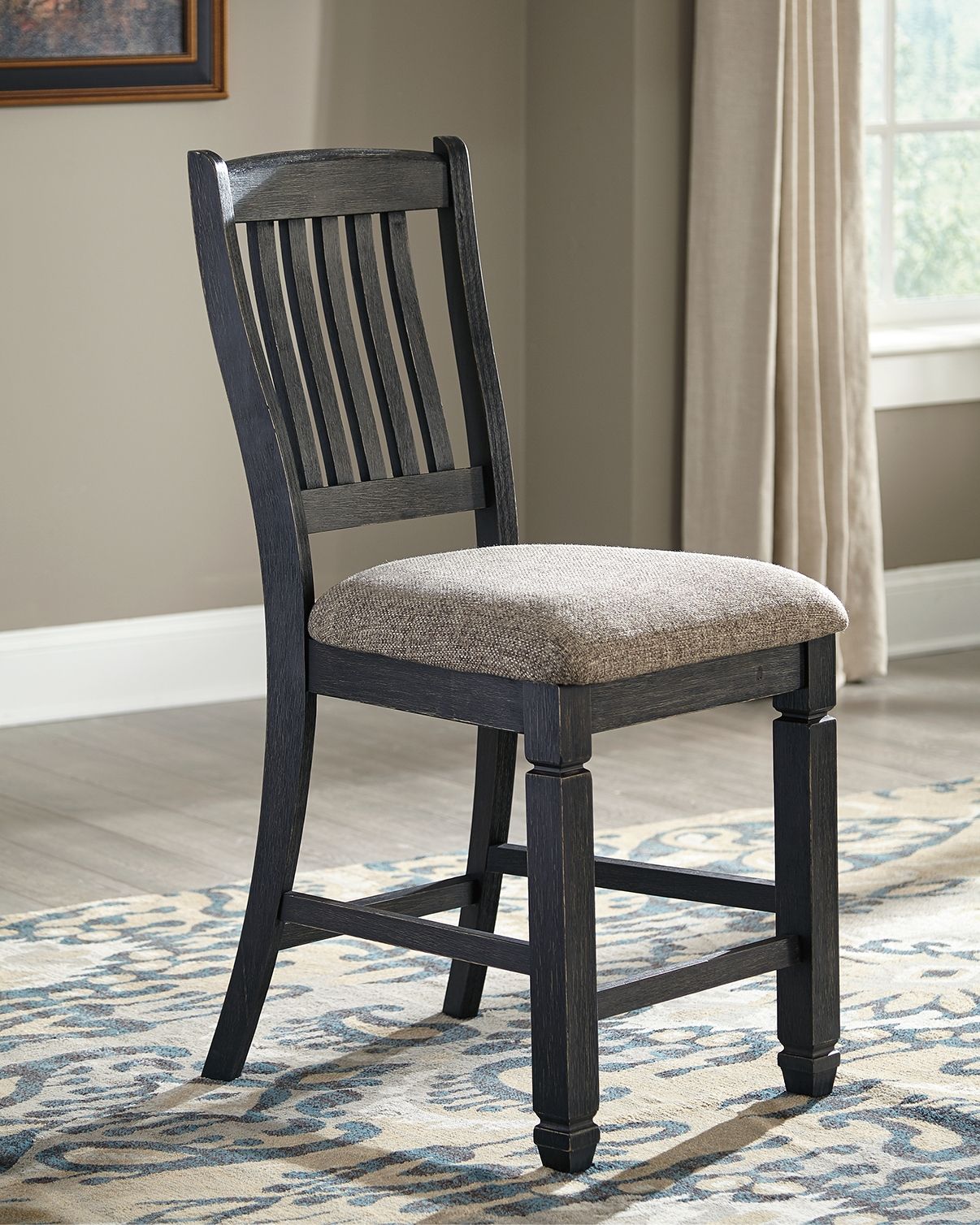 Two-tone barstool with vertical slatted back and cushioned light-gray seat, dark frame