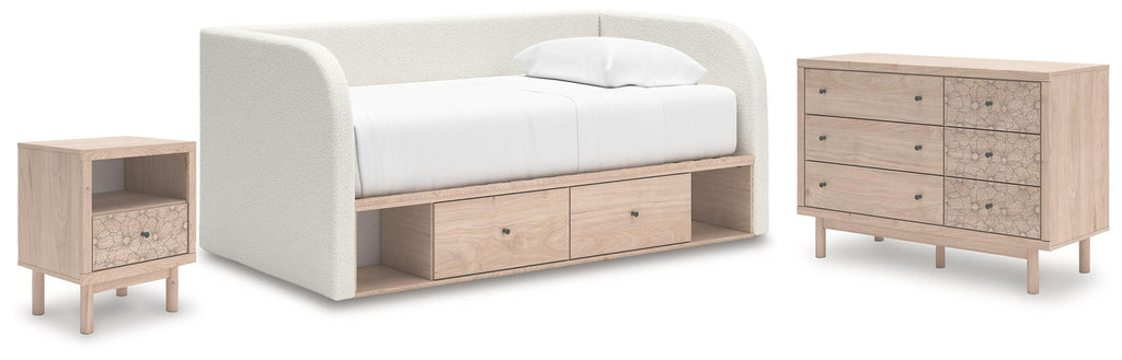 Twin daybed with storage drawers, white upholstery, matching nightstand and dresser
