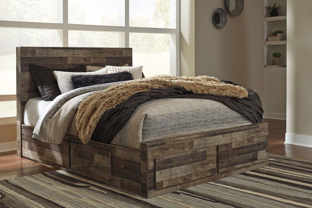 Dark wood panel bed frame with tan faux-fur throw and layered gray bedding