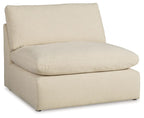 Linen armless chair with beige fabric, thick seat cushion, boxy ottoman base