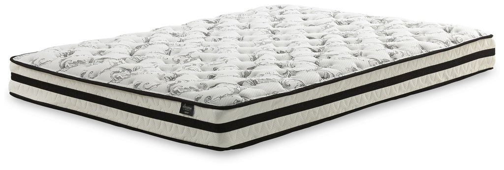 Firm white innerspring mattress with quilted top and black trim edge